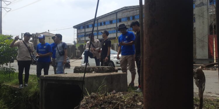Katar Tlajung Udik Turun ke Susukan Akibat Adanya Air Parkir di Jalan