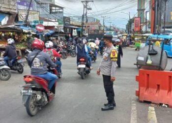 Polsek Citeureup Lakukan Giat Catur Monitoring Lalulintas di Pasar Citeureup
