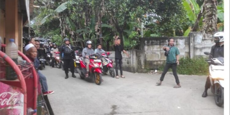 Polsek Ciawi Basmi Pelaku Pungli Yang Menyebabkan Kemacetan Jalan