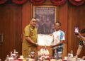 Bupati Bogor Bangga FPTI Torehkan Rekor MURI Lewat Pengibaran Bendera Raksasa di Tebing Lidah Jegger