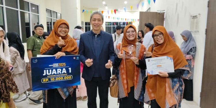 Proyek Bengkel Emak Ojol Sabet Juara 1 BIA 2025